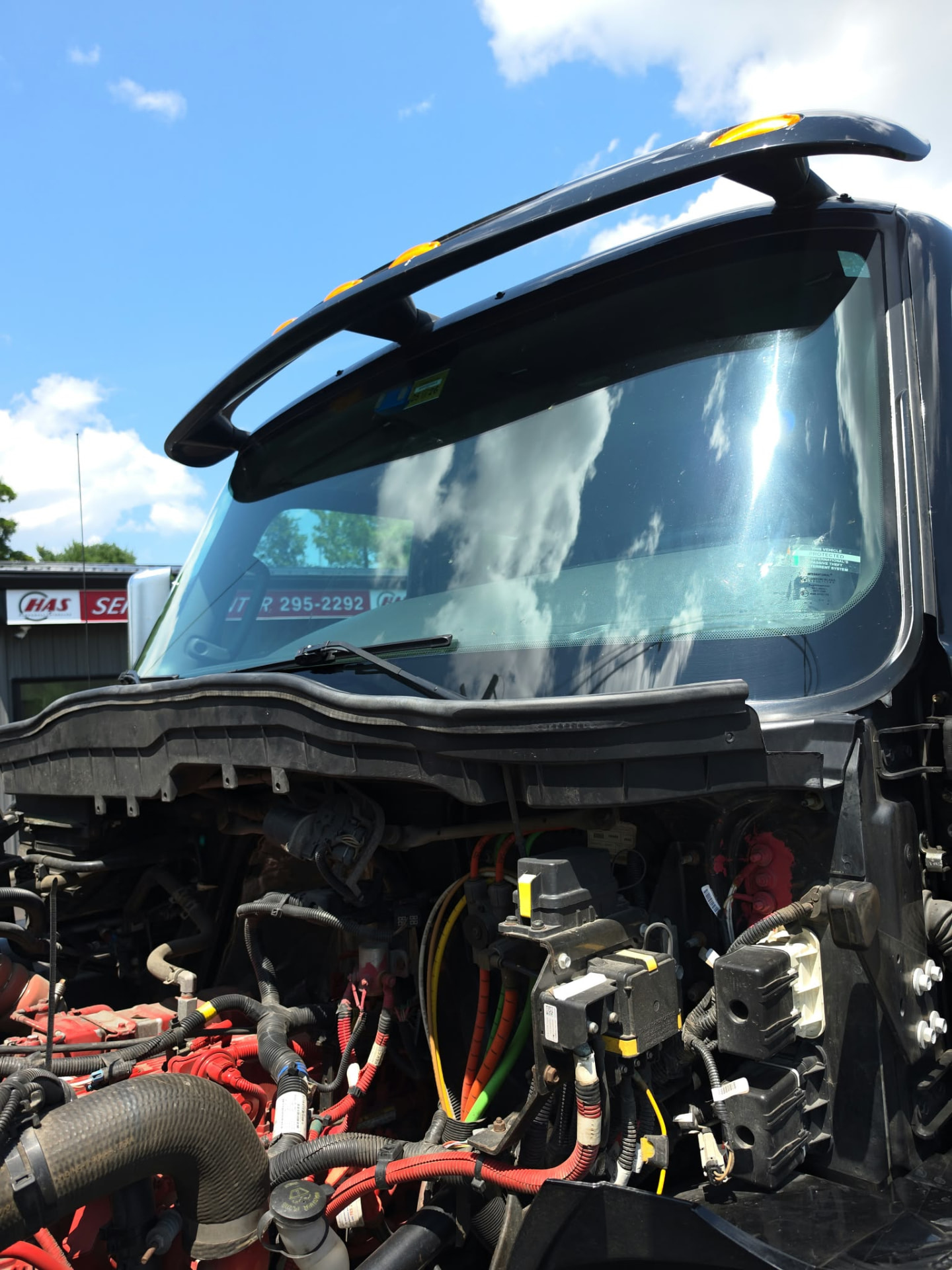 RN Auto Glass commercial truck windshield work outdoors in Maine